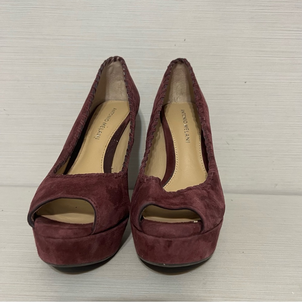 Gently used Antonio Melani suede high heels.